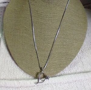 Silvertone love crystal necklace